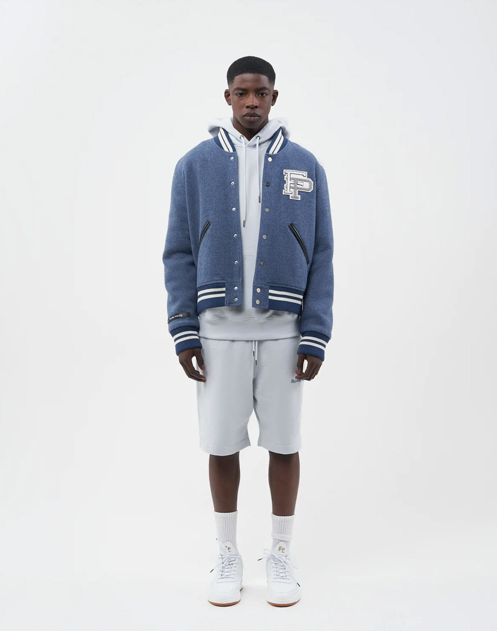 First row denim varsity jacket